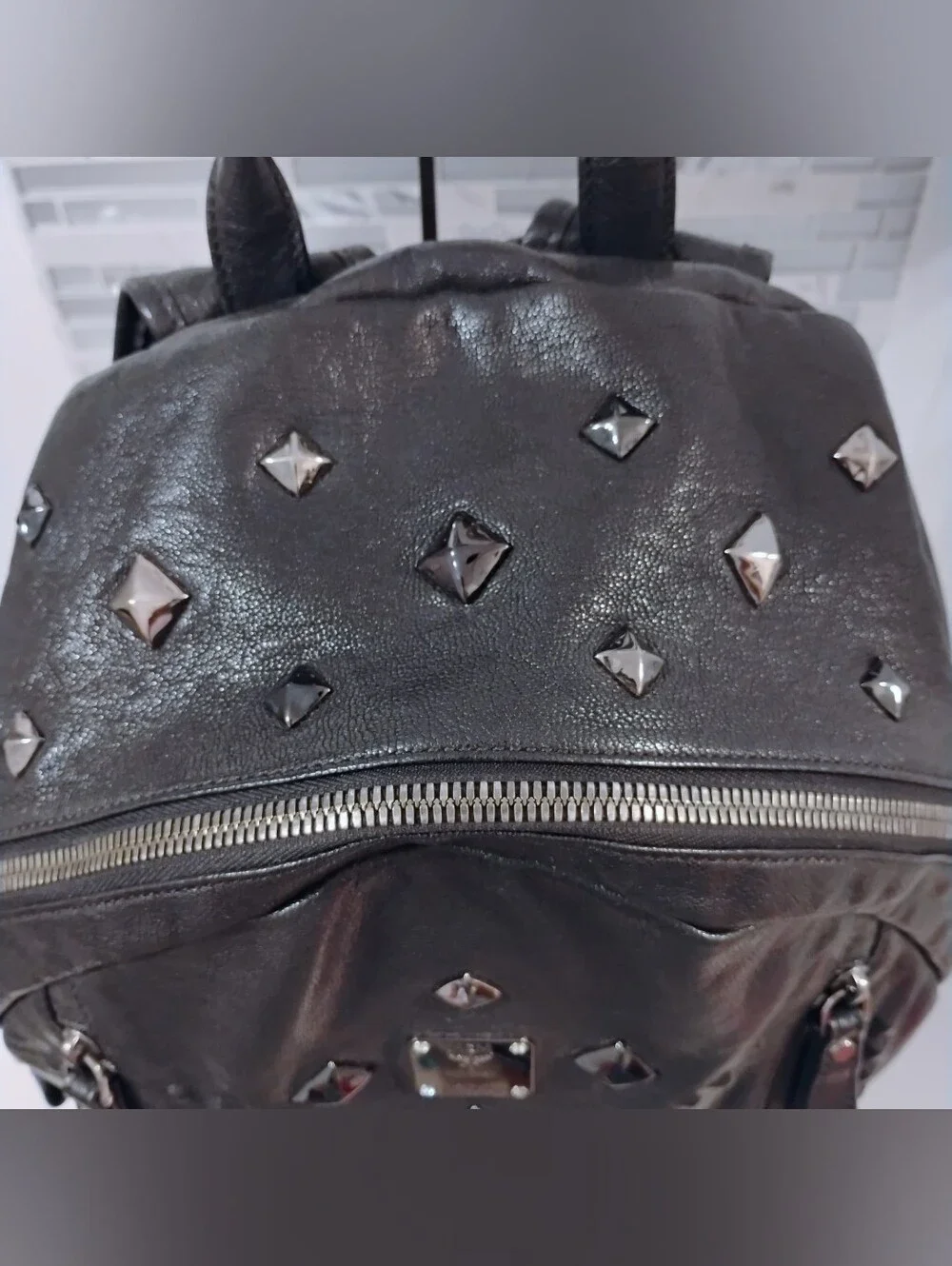 EUC MCM Studded Leather Backpack - Black